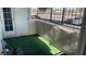 A small covered patio with artificial turf at 1701 E Katie Ave # 91, Las Vegas, NV 89119