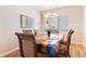 Charming dining area with wood floors, stylish furniture and bright natural light at 174 Augusta Course Ave, Las Vegas, NV 89148
