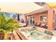 Beautiful hot tub with lounge seating and mature landscaping at 174 Augusta Course Ave, Las Vegas, NV 89148
