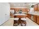 Bright kitchen with island, stainless steel appliances, and ample storage at 174 Augusta Course Ave, Las Vegas, NV 89148