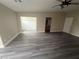 Bedroom featuring vinyl floors, walk-in closet, and neutral-colored walls at 2025 Cary Grant Ct, Las Vegas, NV 89142
