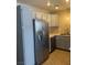 Modern kitchen featuring stainless steel refrigerator, and light-blue cabinets at 2025 Cary Grant Ct, Las Vegas, NV 89142