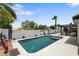A beautiful swimming pool and lush landscaping; a tranquil oasis for outdoor enjoyment at 209 Tamarack Dr, Henderson, NV 89002