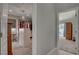 Spacious walk-in closet, featuring custom shelving, hanging racks, and a center island for storage at 209 Tamarack Dr, Henderson, NV 89002