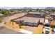 Home featuring an expansive lot, complemented by desert landscaping and beautiful mountain views at 211 E Kimberly Dr, Henderson, NV 89015