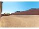 Spacious backyard with desert landscape, perfect for outdoor activities and enjoying nature at 211 E Kimberly Dr, Henderson, NV 89015