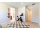 Home gym featuring a workout bicycle, exercise equipment and space for training indoors at 211 E Kimberly Dr, Henderson, NV 89015
