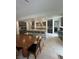 Inviting kitchen with a large island, stainless appliances, dark cabinets, and open layout for seamless entertaining at 211 E Kimberly Dr, Henderson, NV 89015
