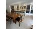 Open-concept kitchen features stainless steel appliances, a large island with seating, and modern pendant lighting at 211 E Kimberly Dr, Henderson, NV 89015