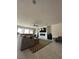 Spacious living room with tile floors, large sectional sofa, and a sleek fireplace at 211 E Kimberly Dr, Henderson, NV 89015