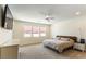 Bright main bedroom with large windows and recessed lighting at 211 E Kimberly Dr, Henderson, NV 89015