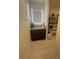 Walk-in pantry featuring ample shelving, natural light, and convenient countertop space for storage and organization at 211 E Kimberly Dr, Henderson, NV 89015