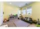 Bright playroom with multiple windows featuring various toys, play furniture and a fun and inviting atmosphere at 211 E Kimberly Dr, Henderson, NV 89015