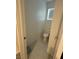 Neat toilet room featuring a toilet and small window at 211 E Kimberly Dr, Henderson, NV 89015