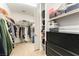 Spacious walk-in closet with ample shelving and hanging space for organized storage and personal belongings at 211 E Kimberly Dr, Henderson, NV 89015