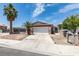 Single-story home boasting desert landscaping, and an attached garage at 2116 Cameron St, Las Vegas, NV 89102