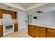 Bright kitchen features white countertops, tile floors, and wood cabinets at 2116 Cameron St, Las Vegas, NV 89102