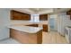 Bright kitchen features white countertops, tile floors, and wood cabinets at 2116 Cameron St, Las Vegas, NV 89102