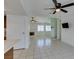Open floor plan with living room, kitchen, tile floors, and fireplace at 2116 Cameron St, Las Vegas, NV 89102