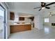 Kitchen features stainless appliances and is attached to living room and backyard access at 2116 Cameron St, Las Vegas, NV 89102