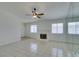 Bright, spacious living room with tile floors, fireplace, and mirrored wall at 2116 Cameron St, Las Vegas, NV 89102