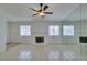 Living room with tile flooring, a brick fireplace, and a mirrored wall at 2116 Cameron St, Las Vegas, NV 89102