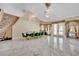 Open dining area featuring tall ceilings, a chandelier, and marble floors at 2131 Diamond Bar Dr, Las Vegas, NV 89117