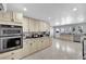 Modern kitchen with updated cabinets, granite countertops, and stainless steel appliances at 2131 Diamond Bar Dr, Las Vegas, NV 89117