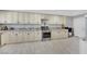 Spacious kitchen features granite countertops, ample cabinet space and modern appliances at 2131 Diamond Bar Dr, Las Vegas, NV 89117
