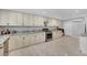 Bright kitchen with granite countertops, stainless steel appliances, and plenty of storage with all wood cabinetry at 2131 Diamond Bar Dr, Las Vegas, NV 89117