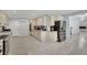Eat-in kitchen featuring stainless steel appliances, custom cabinets, and granite countertops at 2131 Diamond Bar Dr, Las Vegas, NV 89117