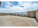 Private backyard enclosed by block wall and fence with landscape view at 2194 Pigeon Hawk St, Las Vegas, NV 89138