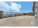 Fenced backyard with a scenic view provides privacy and relaxation at 2194 Pigeon Hawk St, Las Vegas, NV 89138
