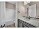 Bathroom features white quartz countertop and dark cabinets at 2194 Pigeon Hawk St, Las Vegas, NV 89138