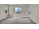 Bedroom featuring an exterior door, carpet and scenic views from the window at 2194 Pigeon Hawk St, Las Vegas, NV 89138