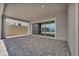 Covered patio with tiled flooring and sliding glass doors at 2194 Pigeon Hawk St, Las Vegas, NV 89138