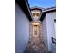 Inviting front entryway featuring a modern door, brick accents, and a covered porch at 2194 Pigeon Hawk St, Las Vegas, NV 89138