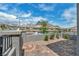 Beautifully landscaped front yard featuring a brick driveway, offering views of the mountains in the distance at 2194 Pigeon Hawk St, Las Vegas, NV 89138