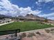 Community green space with walking paths, picnic areas, and lush landscaping at 2194 Pigeon Hawk St, Las Vegas, NV 89138