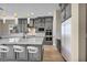 Modern kitchen with a large island, stainless steel appliances, and ample cabinet space at 2194 Pigeon Hawk St, Las Vegas, NV 89138