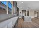 Contemporary kitchen with gray cabinets, quartz countertops, stainless steel appliances, and hardwood floors at 2194 Pigeon Hawk St, Las Vegas, NV 89138
