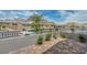 Paver patio with black iron fence and mountain views at 2194 Pigeon Hawk St, Las Vegas, NV 89138