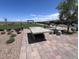 Outdoor ping pong table with seating, grass, and landscaping in community park at 2194 Pigeon Hawk St, Las Vegas, NV 89138