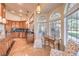 Charming kitchen with custom cabinets, granite countertops, and backyard views at 2201 Country Cottage Ct, Las Vegas, NV 89117