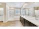 Bathroom features a modern shower, double sink vanity, and bright natural light at 234 Polaris Ridge Ave, Henderson, NV 89011