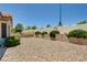Low-maintenance backyard with rock landscaping and greenery at 2545 Banora Point Dr, Las Vegas, NV 89134