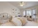 Comfortable bedroom boasts bright natural light and calming color palette at 2545 Banora Point Dr, Las Vegas, NV 89134