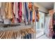 Walk-in closet featuring double clothing racks and access to the rest of the house at 2545 Banora Point Dr, Las Vegas, NV 89134