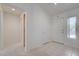 Bright entryway with tile floors, a closet, and ample natural light from the window at 2545 Banora Point Dr, Las Vegas, NV 89134