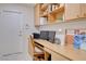 Home office provides a large desk area, storage and exterior access at 2545 Banora Point Dr, Las Vegas, NV 89134